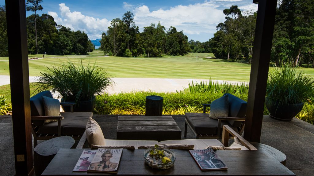 Relaxed and laid back atmosphere, with a view of Thailand through the opening in the fairway.