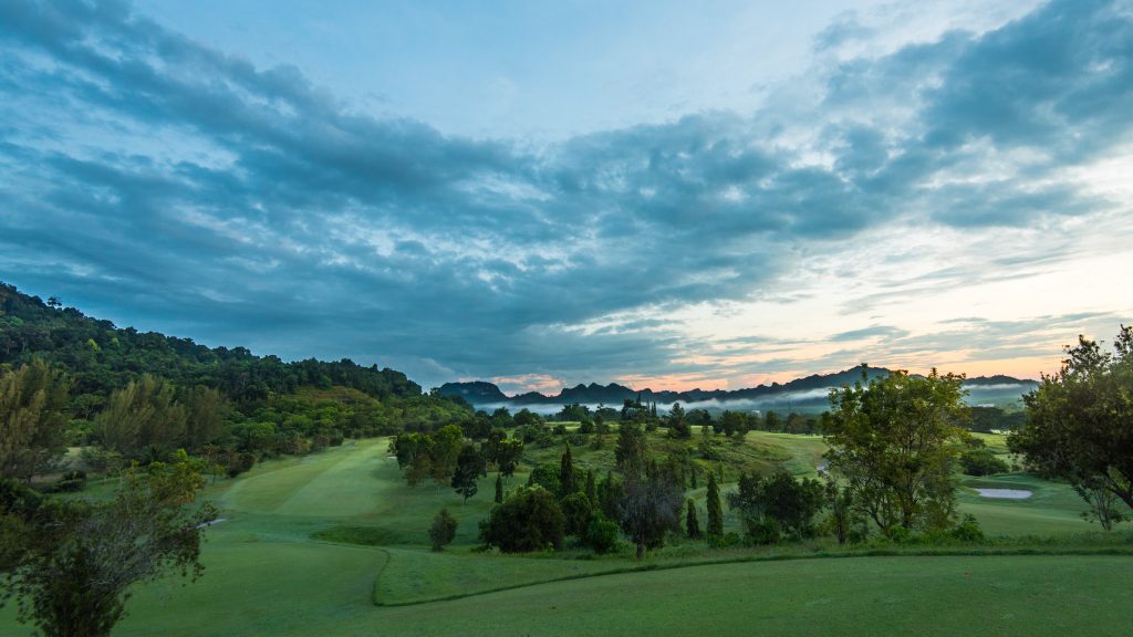 Stunning jungle sunrise at Gunung Raya Golf Club.